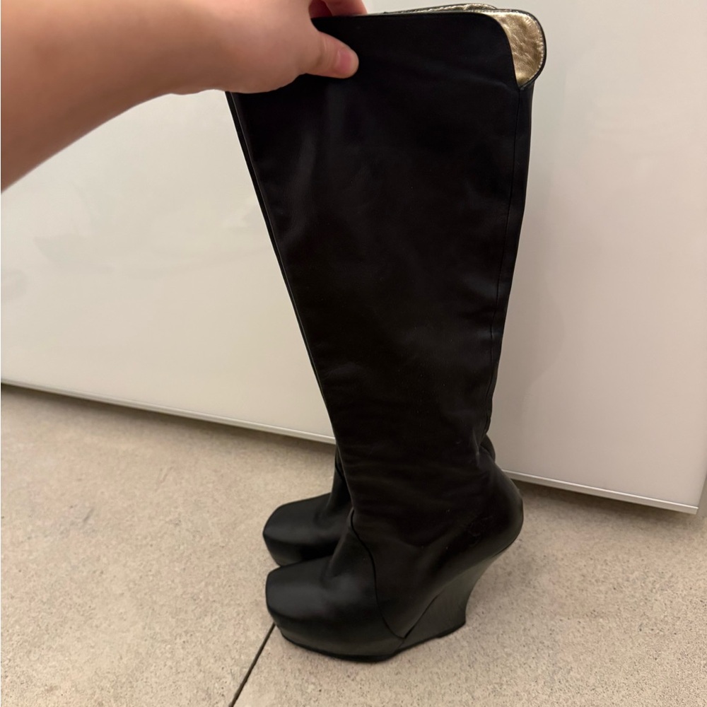 John Fluevog Black Over-the-Knee Wedge Boots with Gold Cuff Accent
